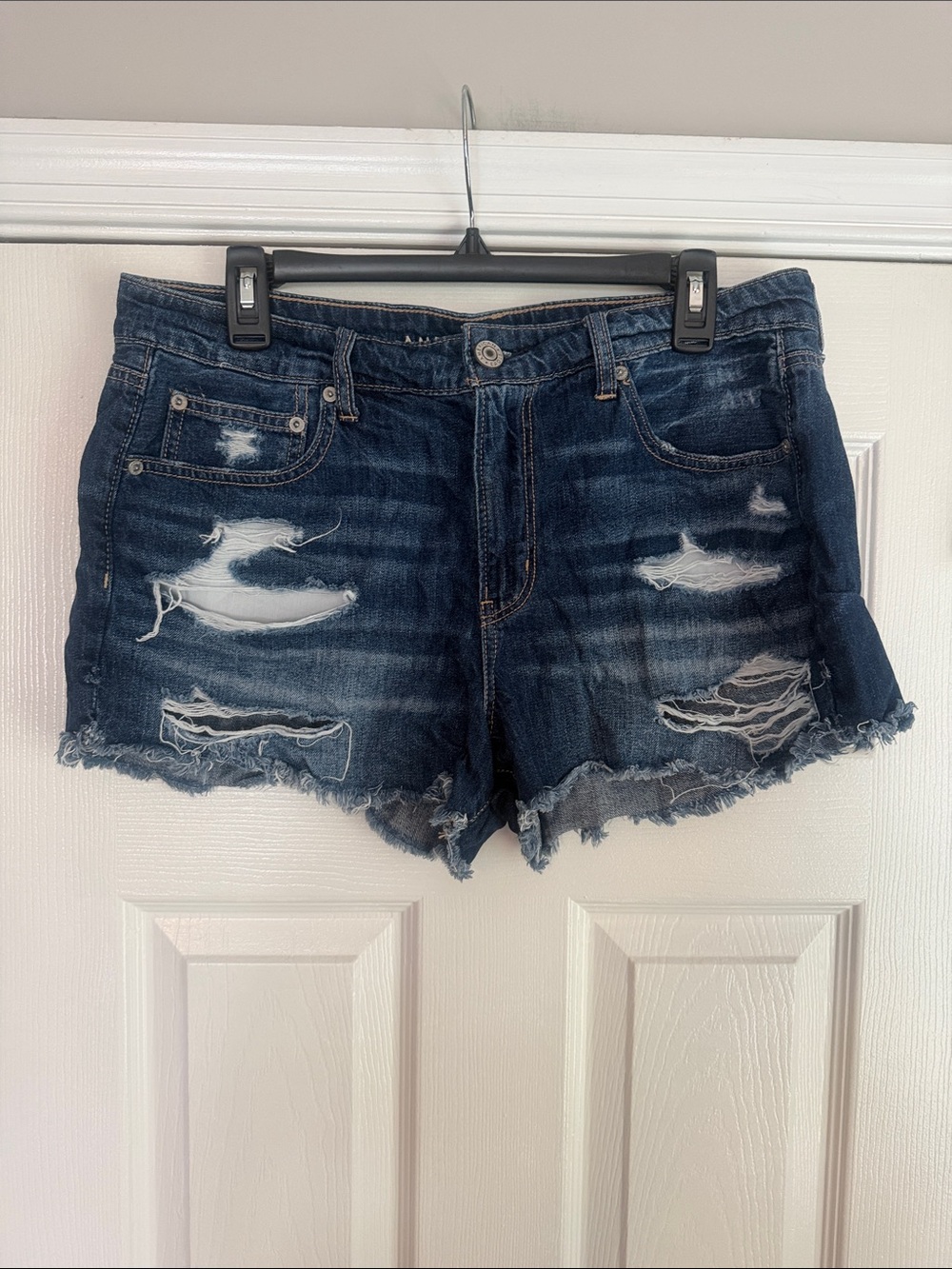 American Eagle Distressed Dark Wash Denim Shorts with rough hem - Navy Blue